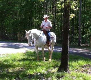 552179_349590675076625_100000770861826_872823_1802826724_nGary-on-saddle